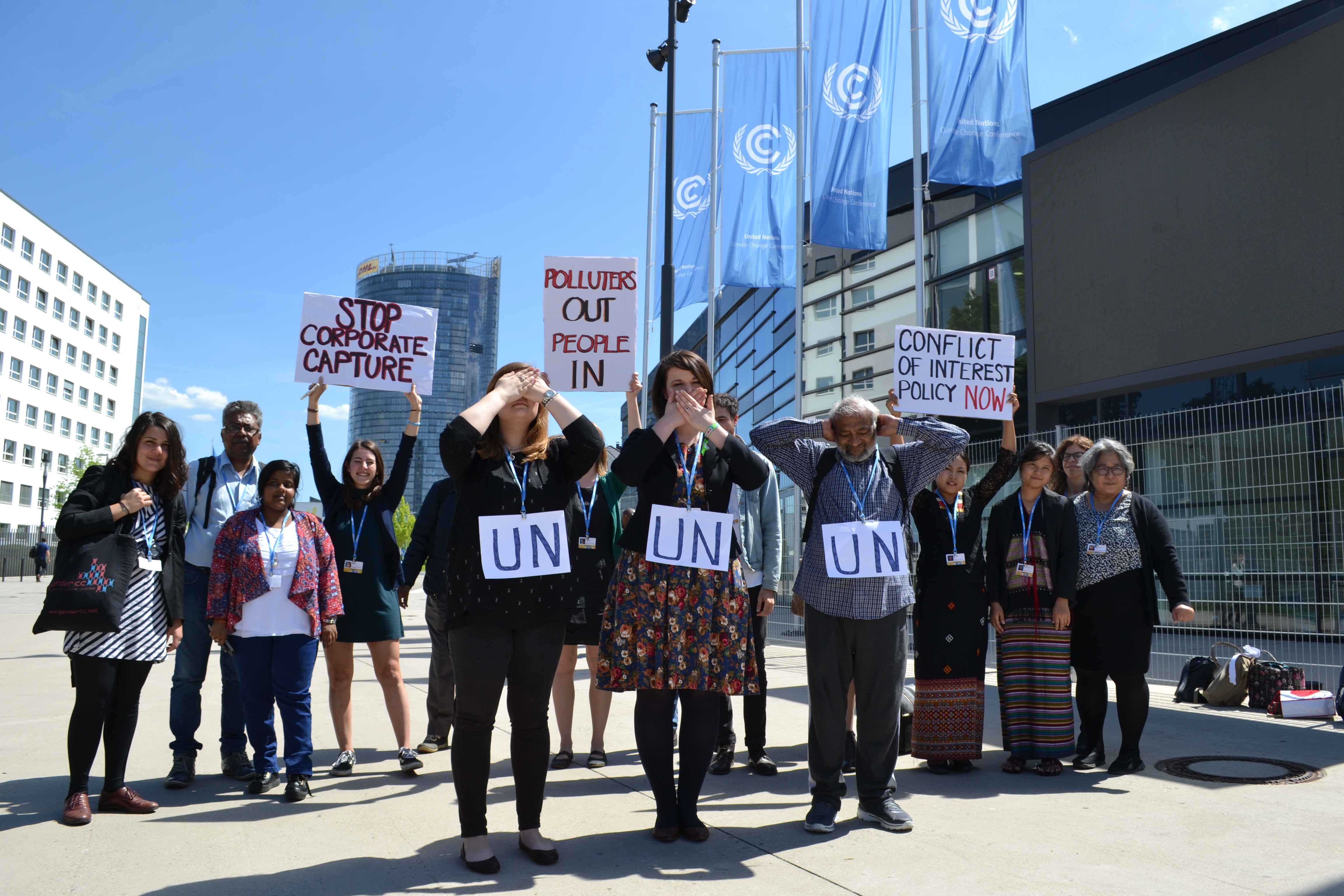 Members of civil society gathered outside the UN meetings to challenge the corporate influence inside the talks. (Photo: Corporate Accountability International)