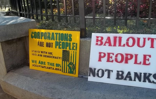 Signs from Atlanta’s “Money Out, Voters In” rally. (Photo: United for the People Georgia, Flickr CC BY 2.0)